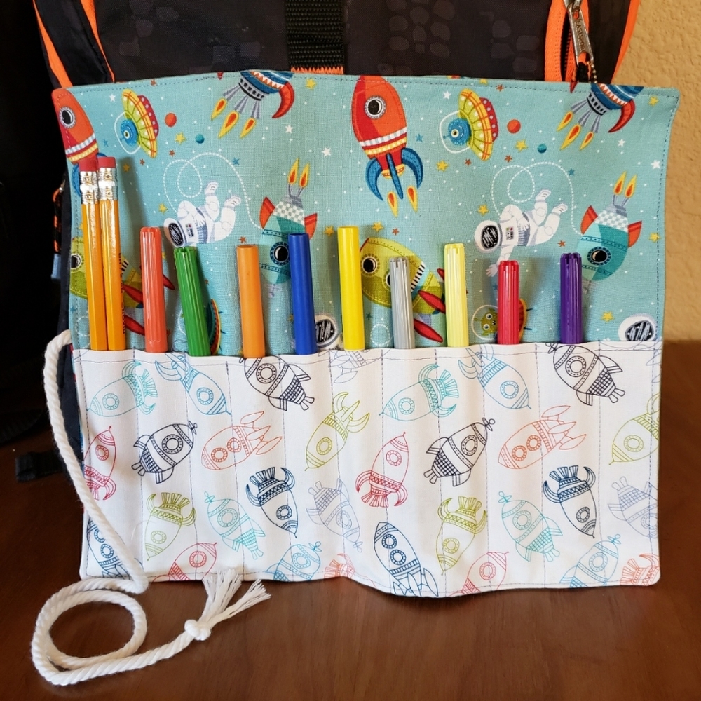 Homemade rollup pencil case for road trips, or summer projects, back to school.